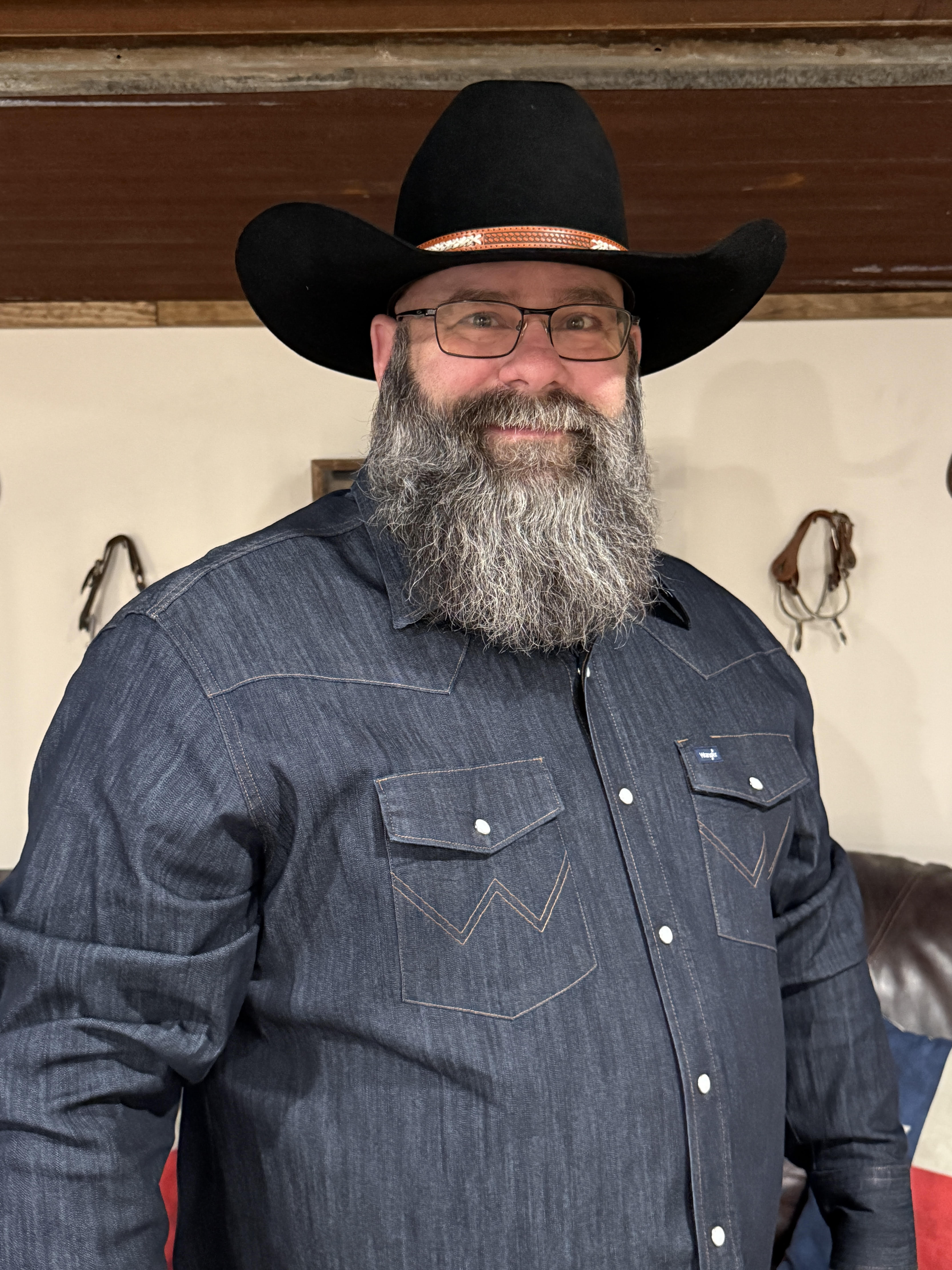 Shane Hindman, Republican candidate for Justice of the Peace, Precinct 3, San Jacinto County, Texas, standing in formal attire